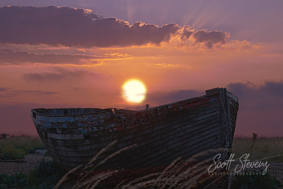 Old Boat At Sunset